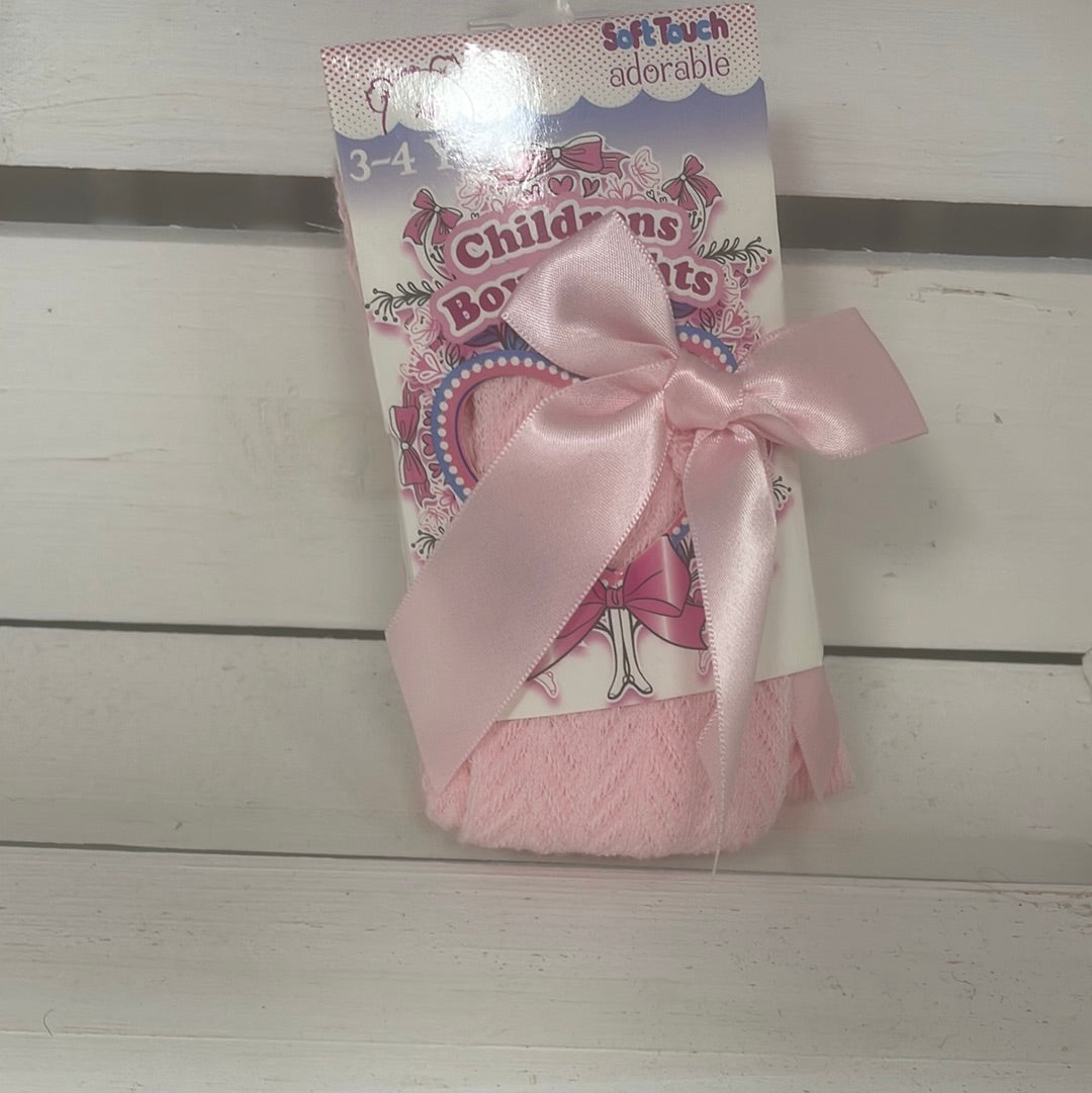 Childrens bow tights pink.