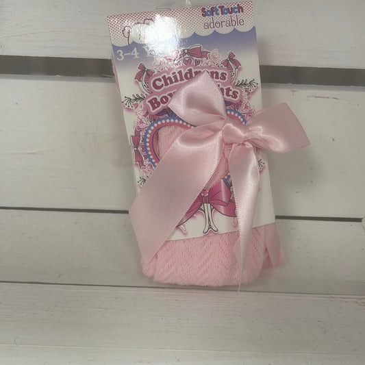 Childrens bow tights pink.