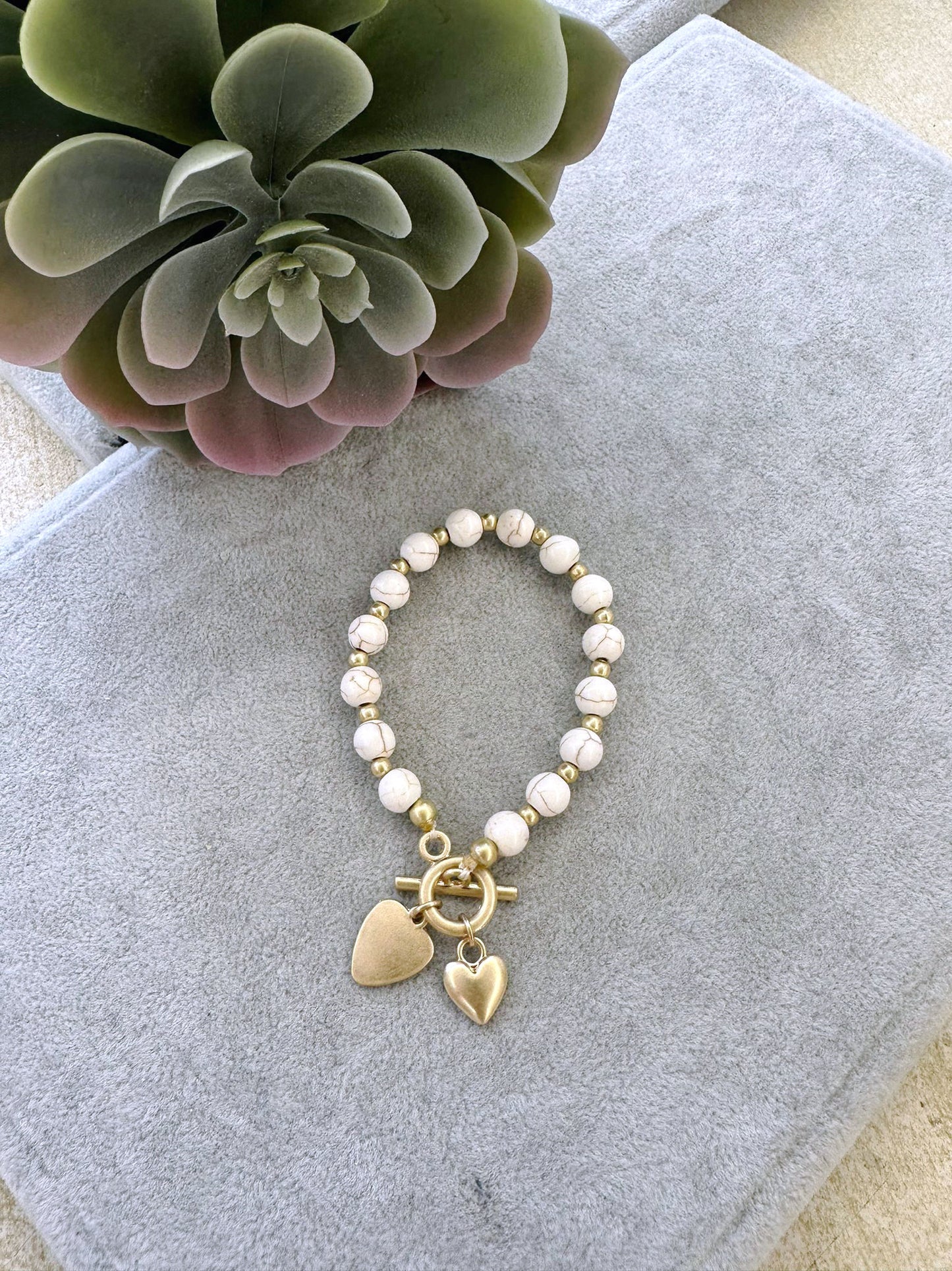 Heart charm beaded bracelet