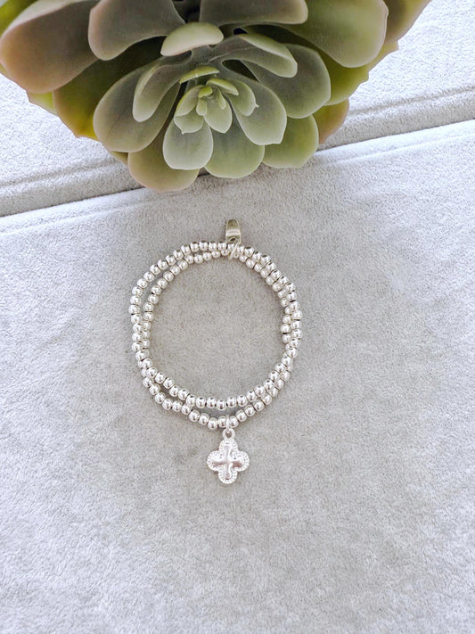 Clover charm intertwined bracelet