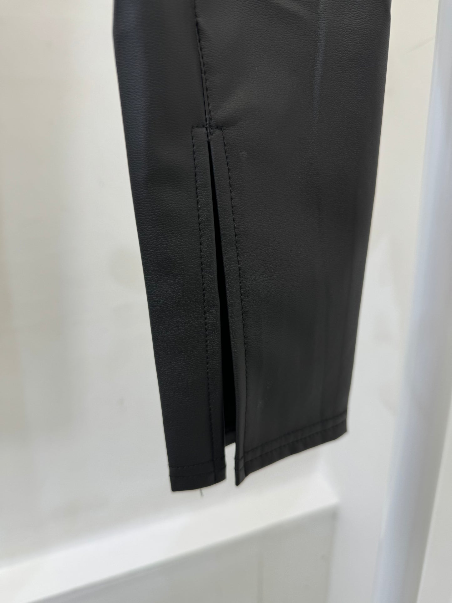 black leather trousers with front split