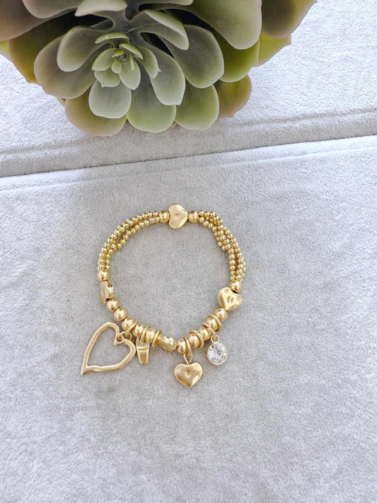 Heart charm bracelet silver and gold