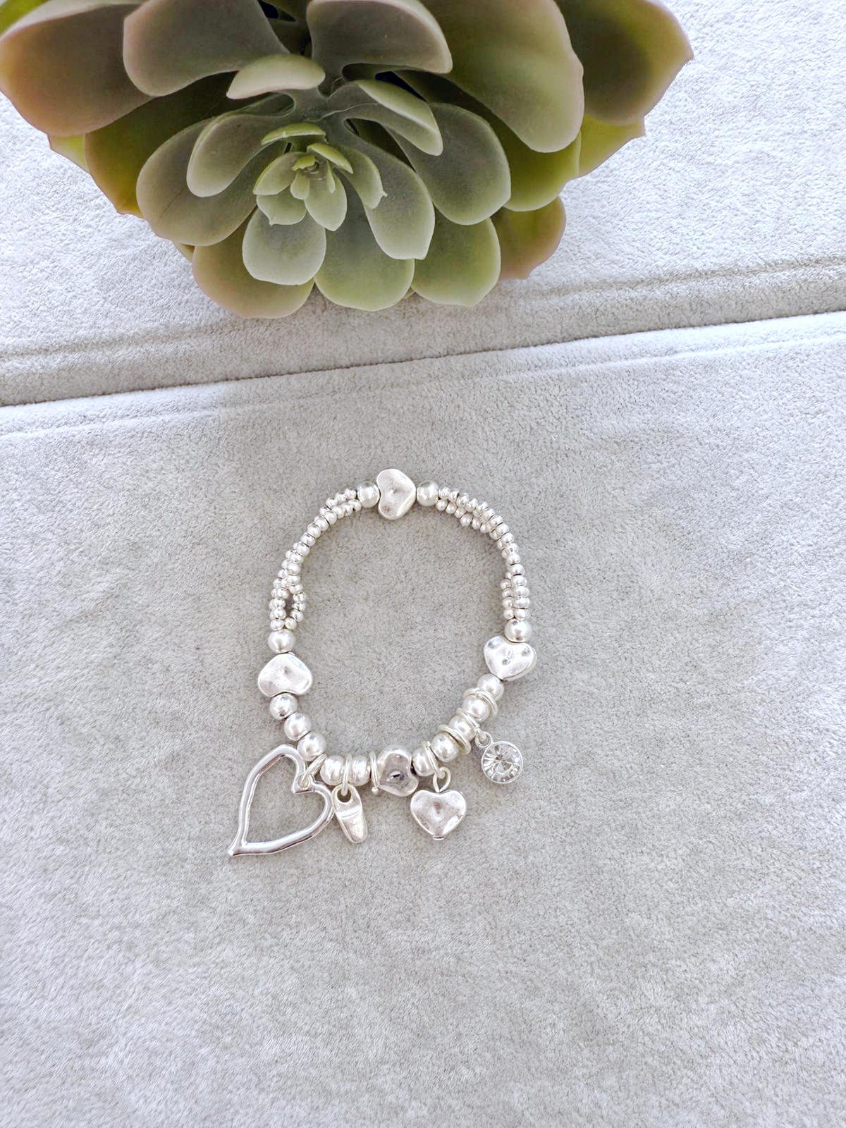 Heart charm bracelet silver and gold