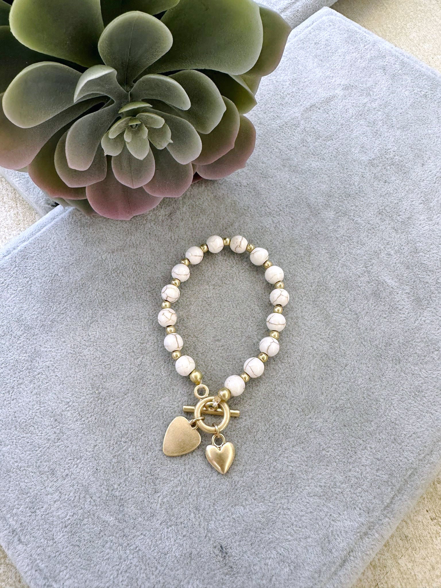 Heart charm beaded bracelet
