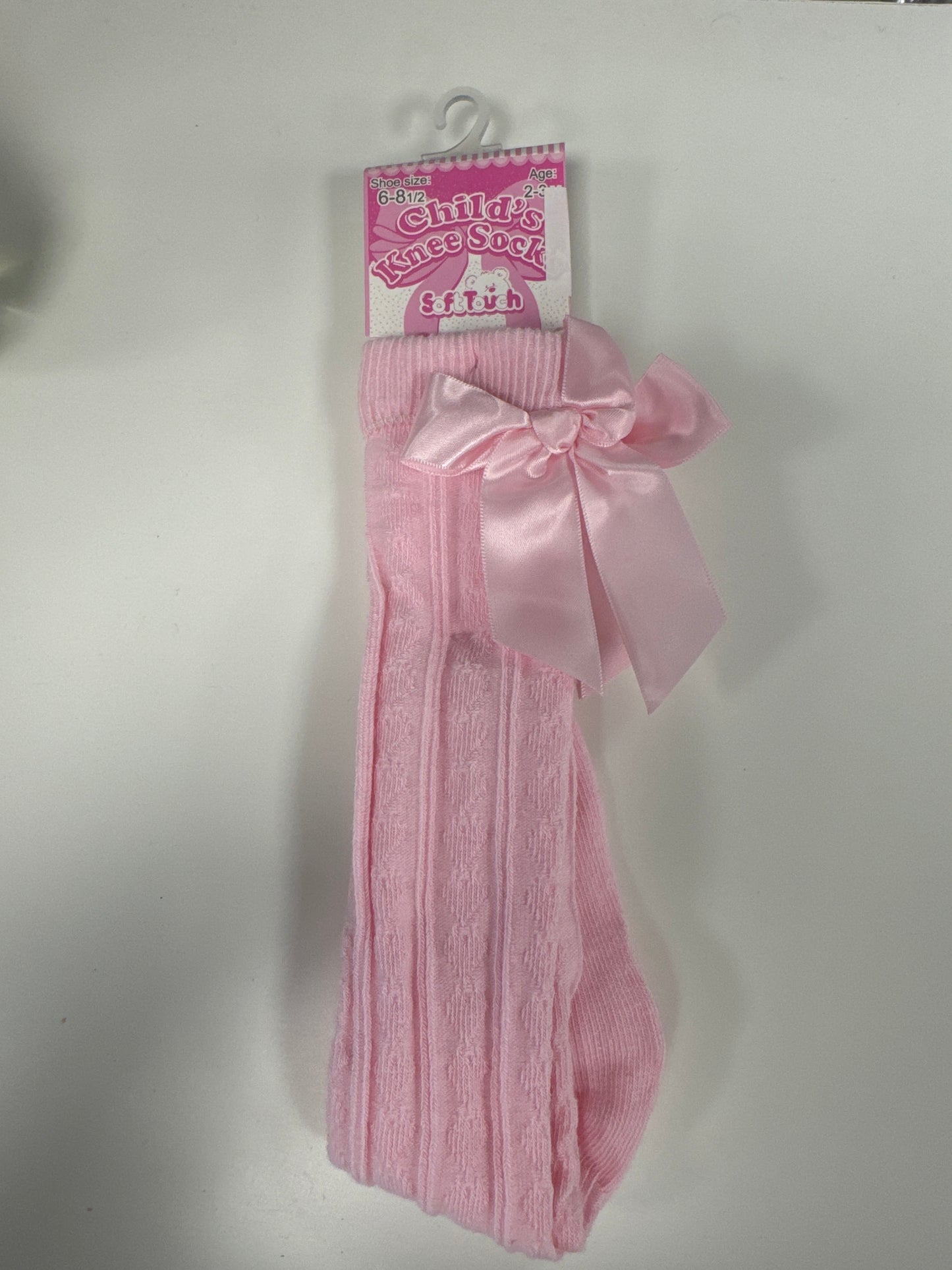 Pink knee-high socks ￼