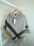 Natalie’s poncho ￼
