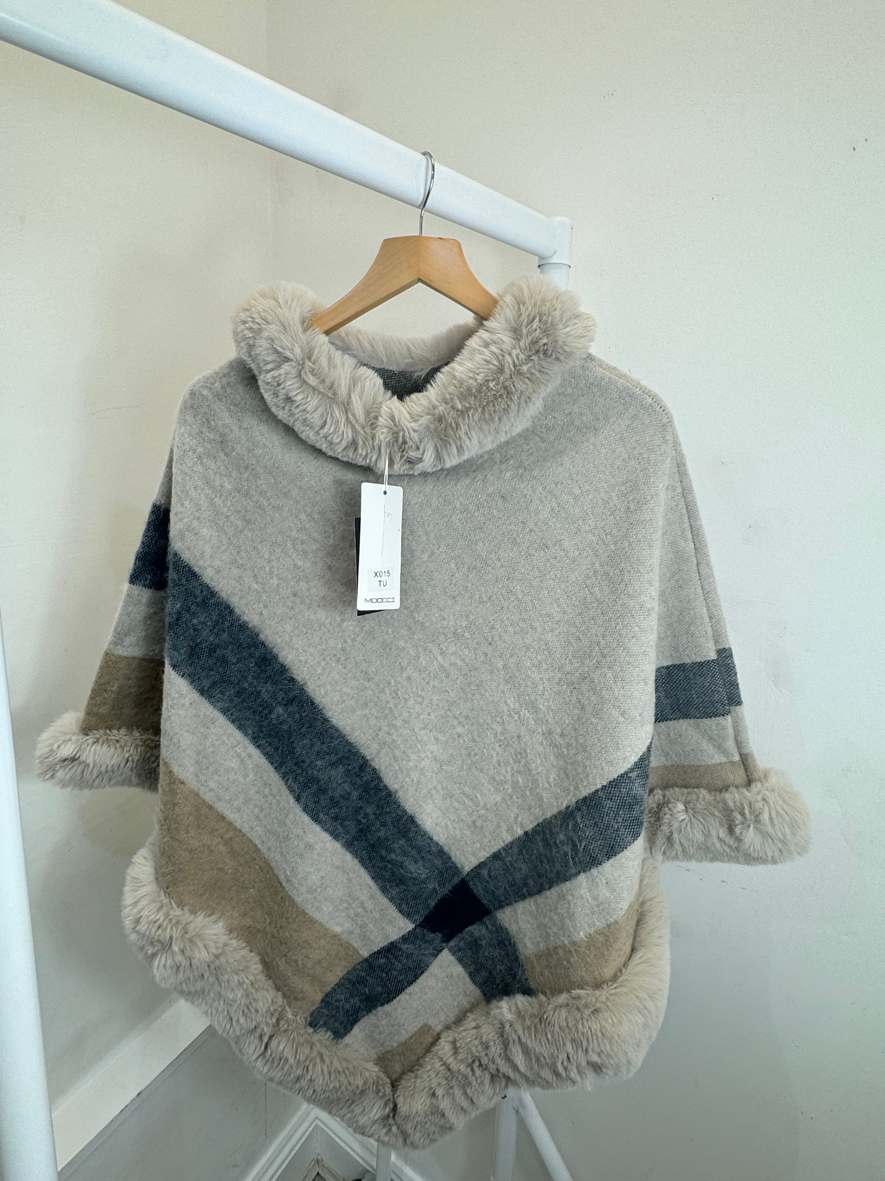 Natalie’s poncho ￼
