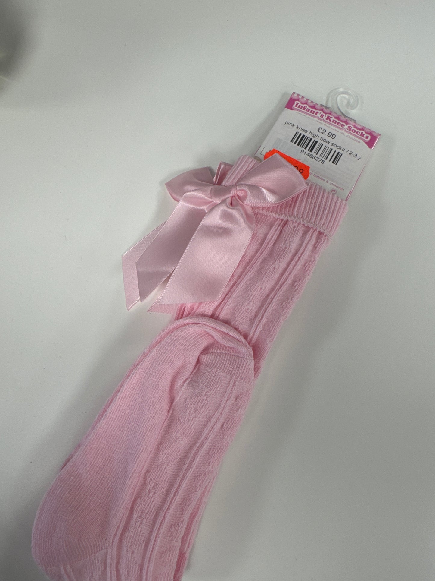 Pink knee-high socks ￼