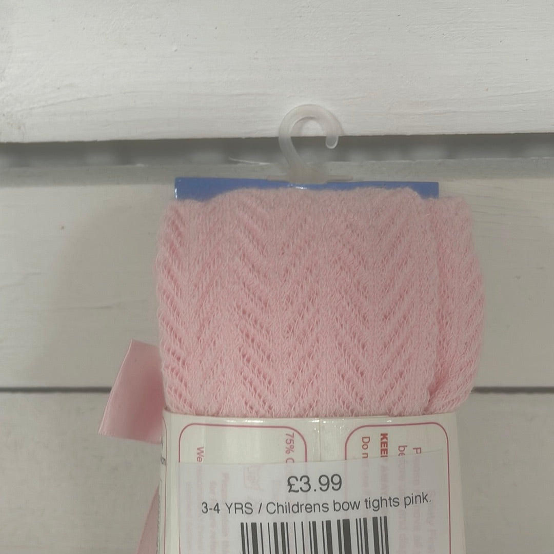 Childrens bow tights pink.