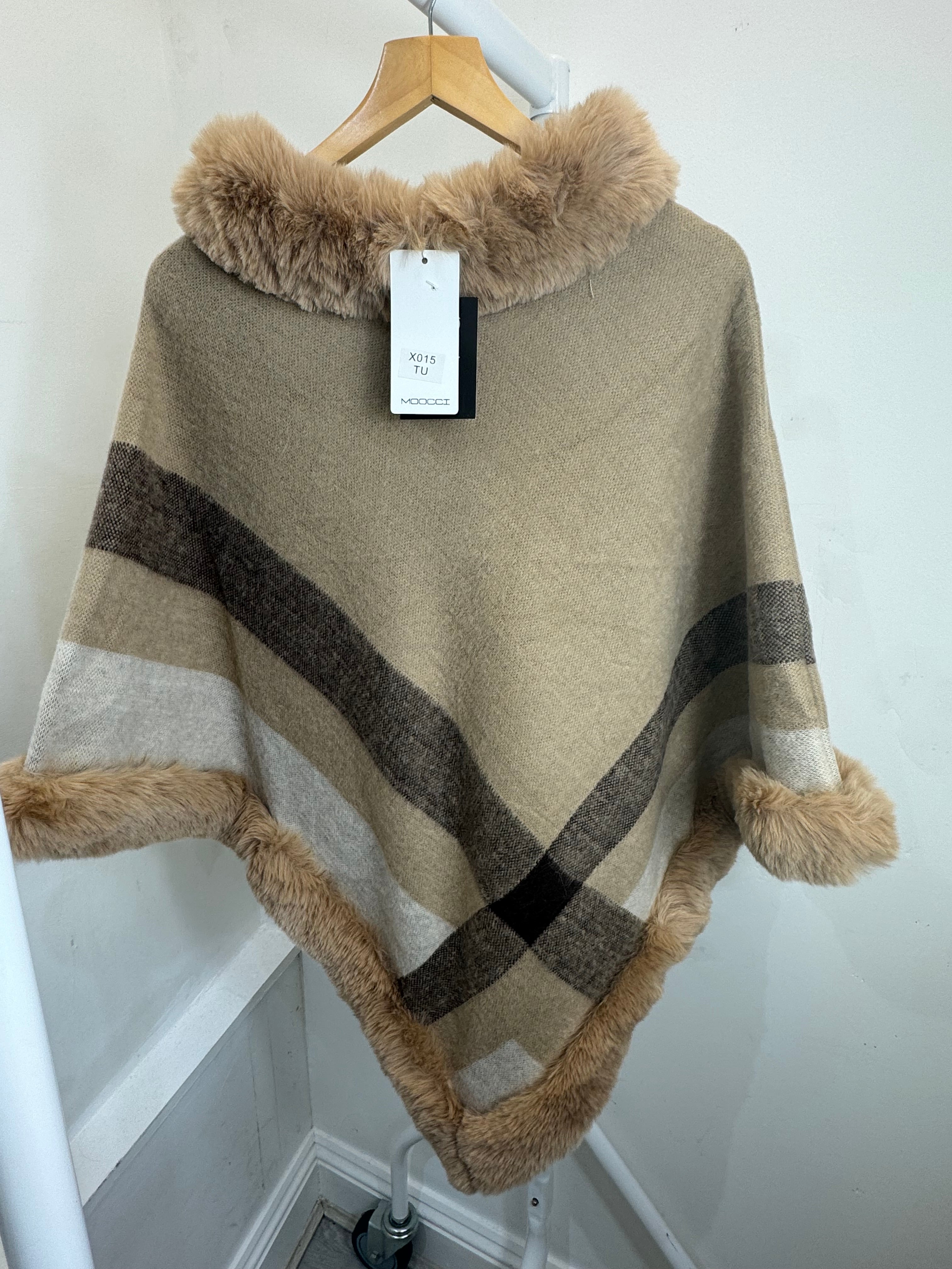Natalie’s poncho ￼