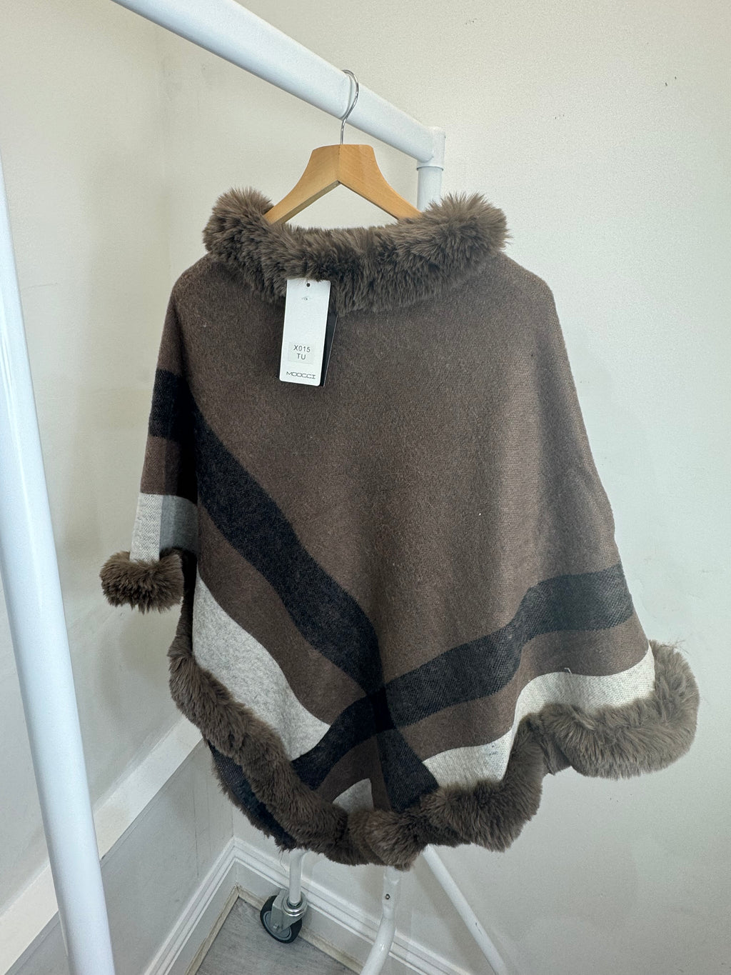 Natalie’s poncho ￼