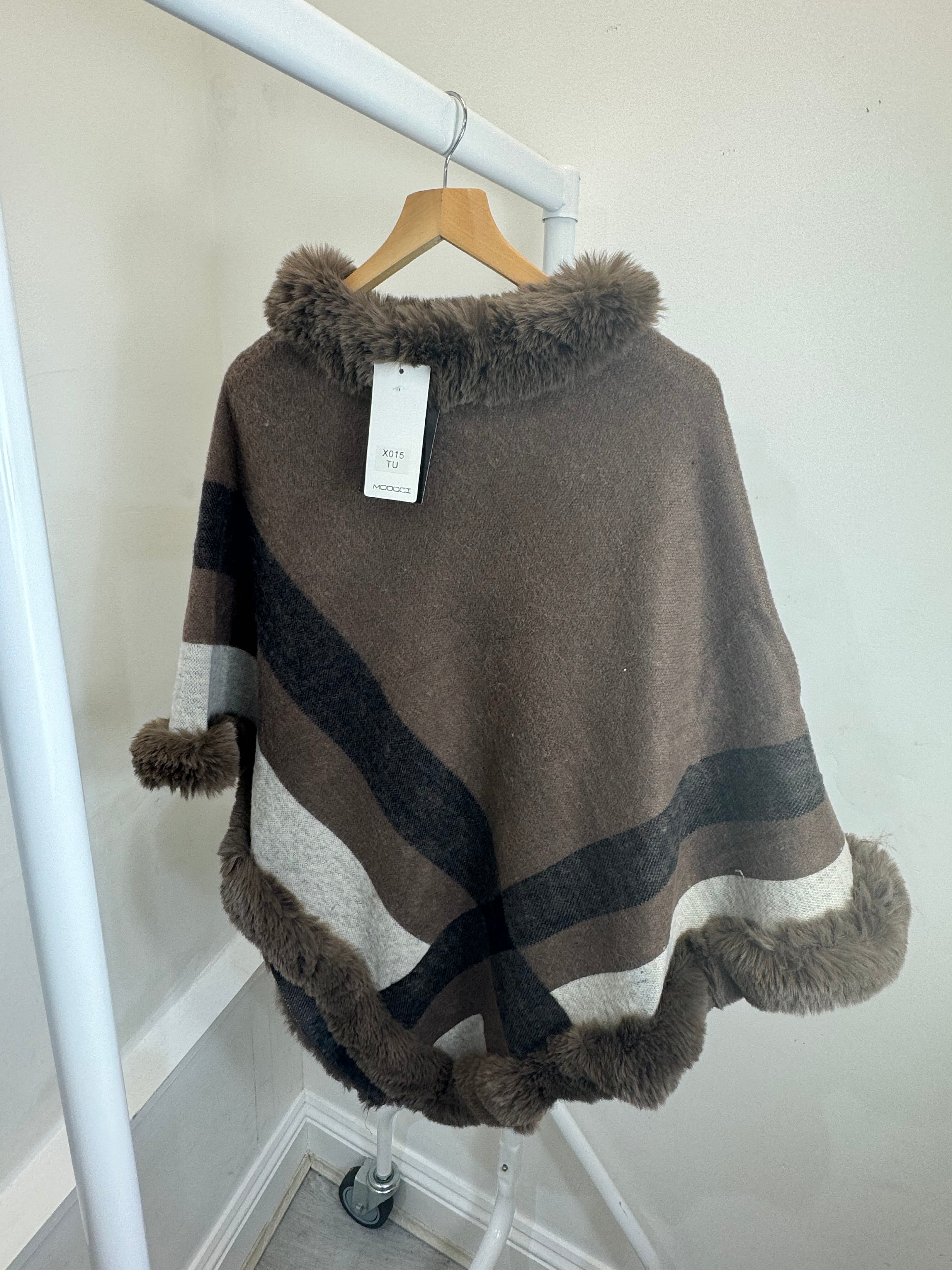 Natalie’s poncho ￼