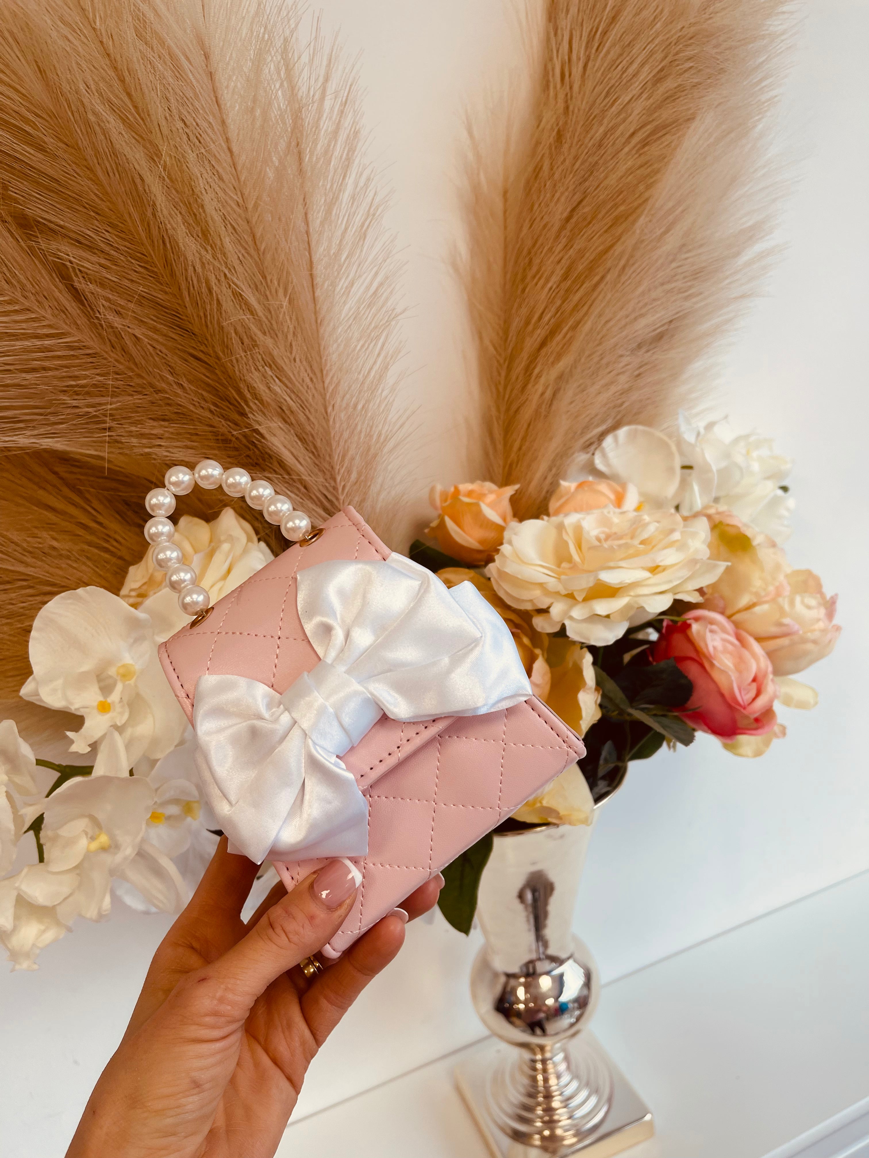 Little bag with white bow