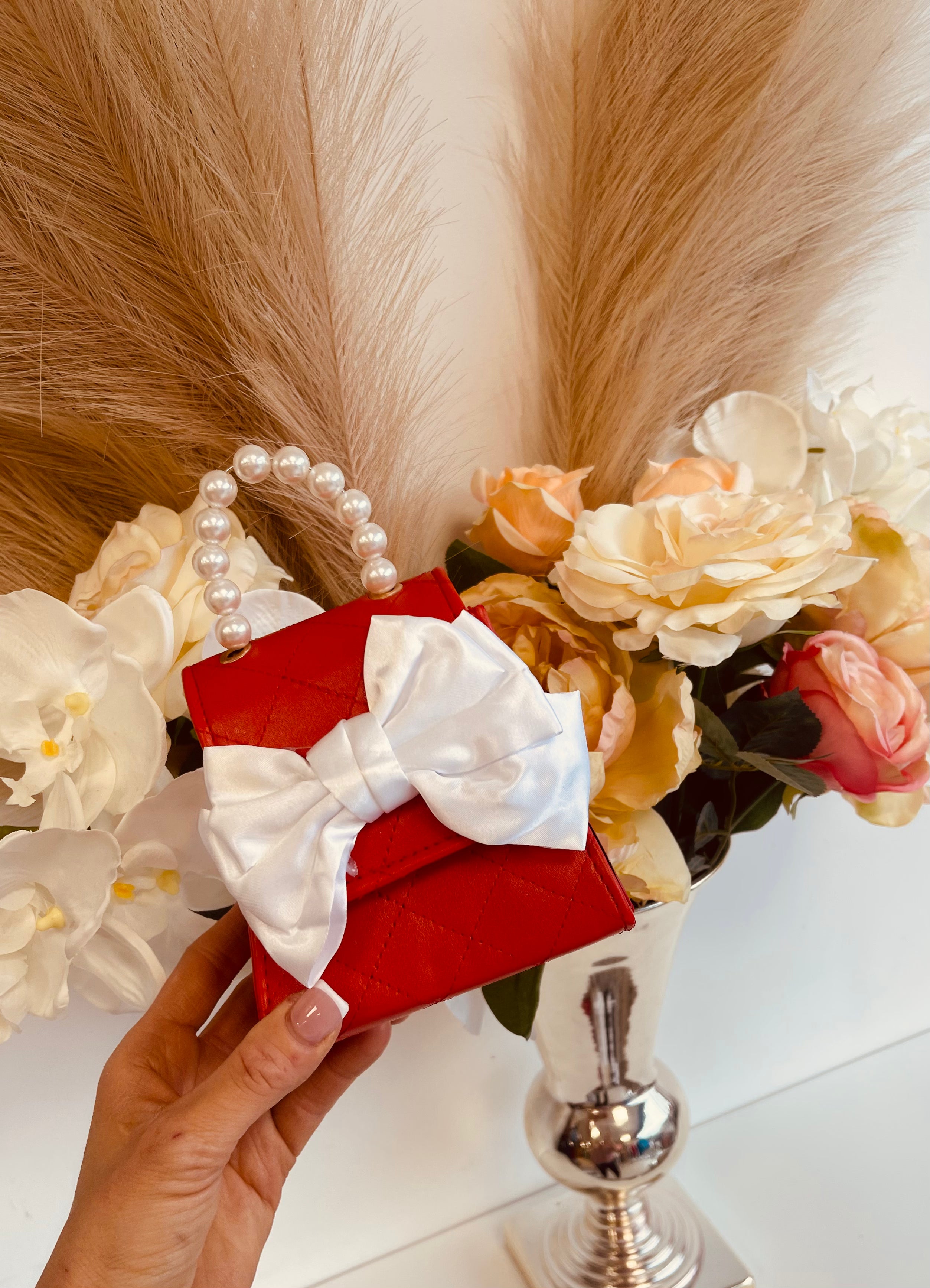 Little bag with white bow